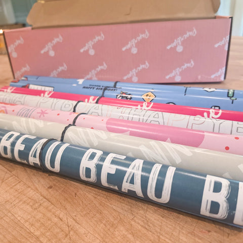 Rolls of personalized Paperbloom wrapping paper