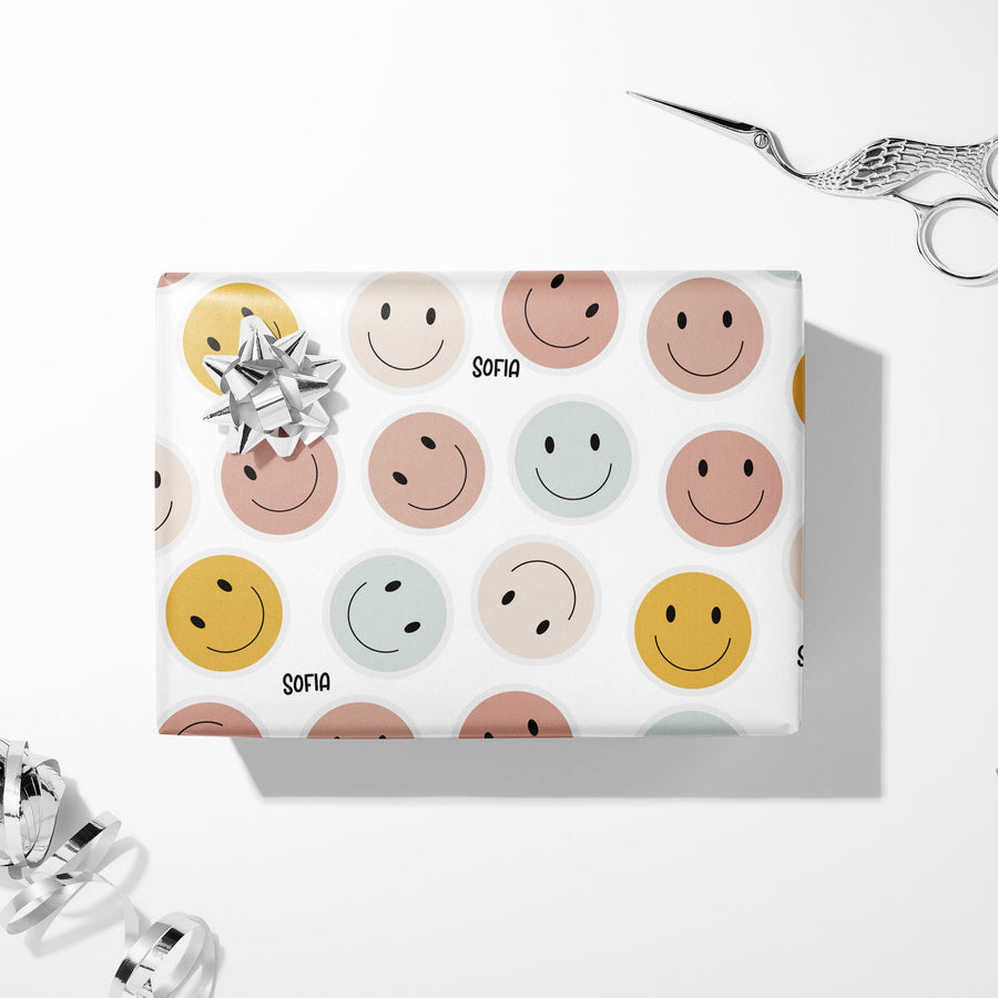 All the Smiles wrapping paper — wrapped gift with bow